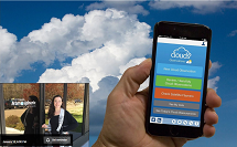 A hand holds a mobile device with a background of clouds.  Inset in the lower left is a picture of a women scientist.