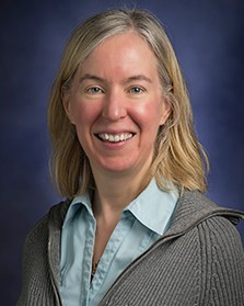 A head shot style image of a woman.