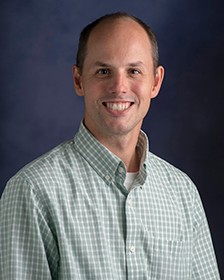 A head shot style image of a man.