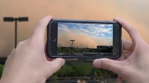 Phone being used to document a dust storm