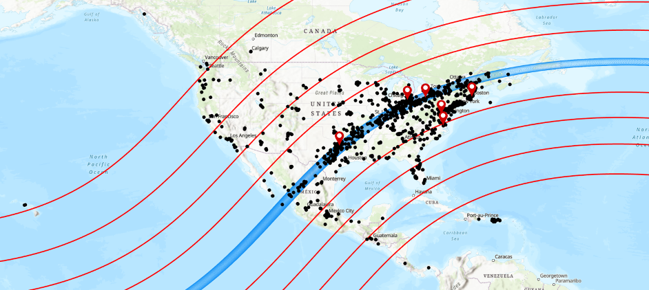 A map showing the path of totality in blue, crossing North America diagonally from the Pacific coast of Mexico to the Atlantic coast of Canada.. Red lines represent a partial eclipse.